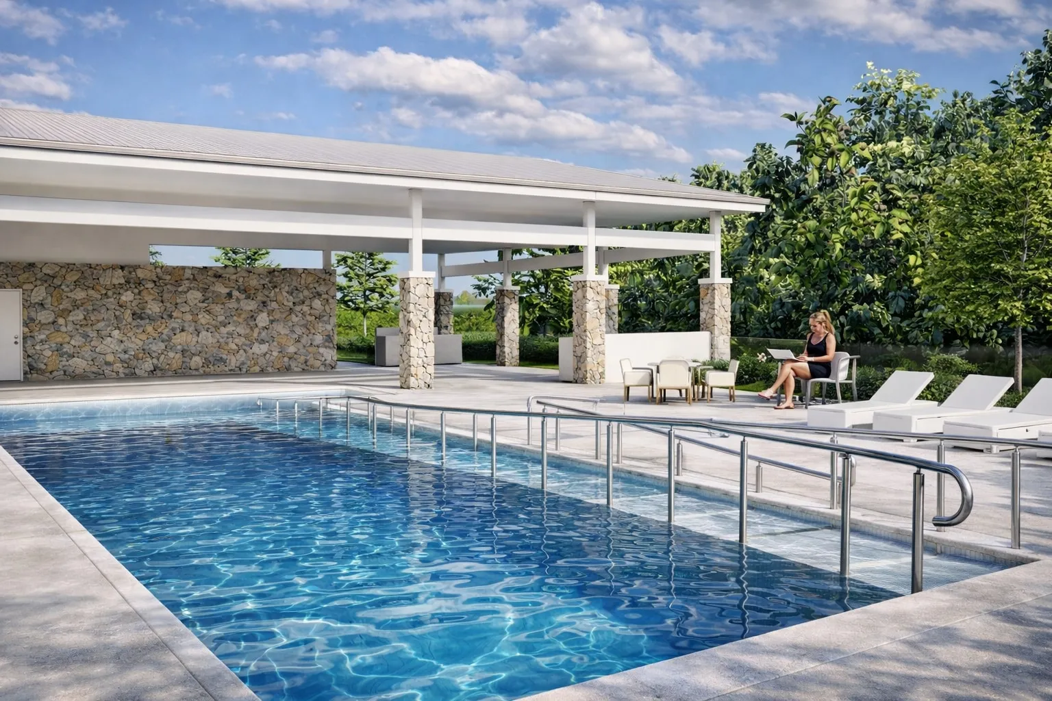 Resort-style pool at the Solara Club, shaded by a stone-columned pavilion